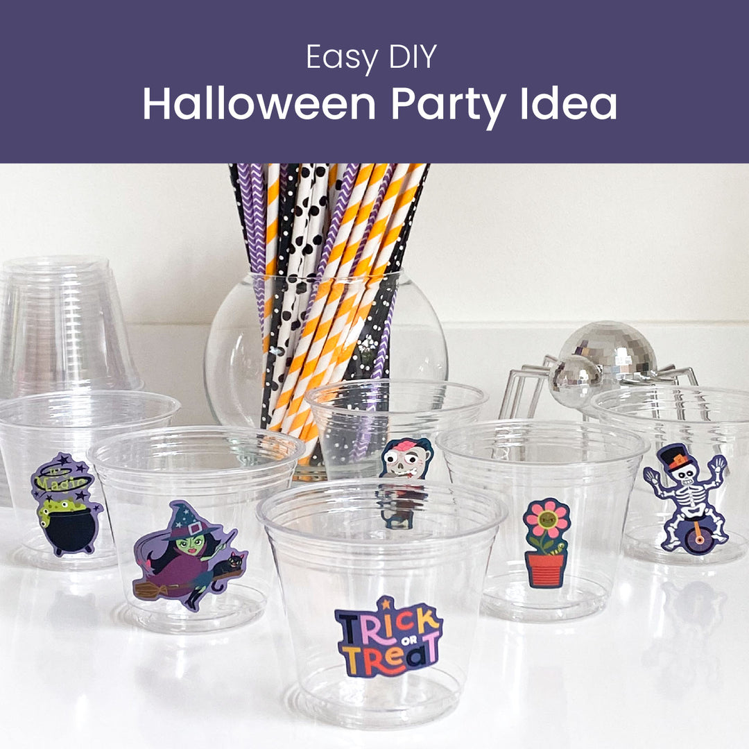 Party cups decorated with fun Halloween stickers for a fun party decor idea by Gigglemugg.