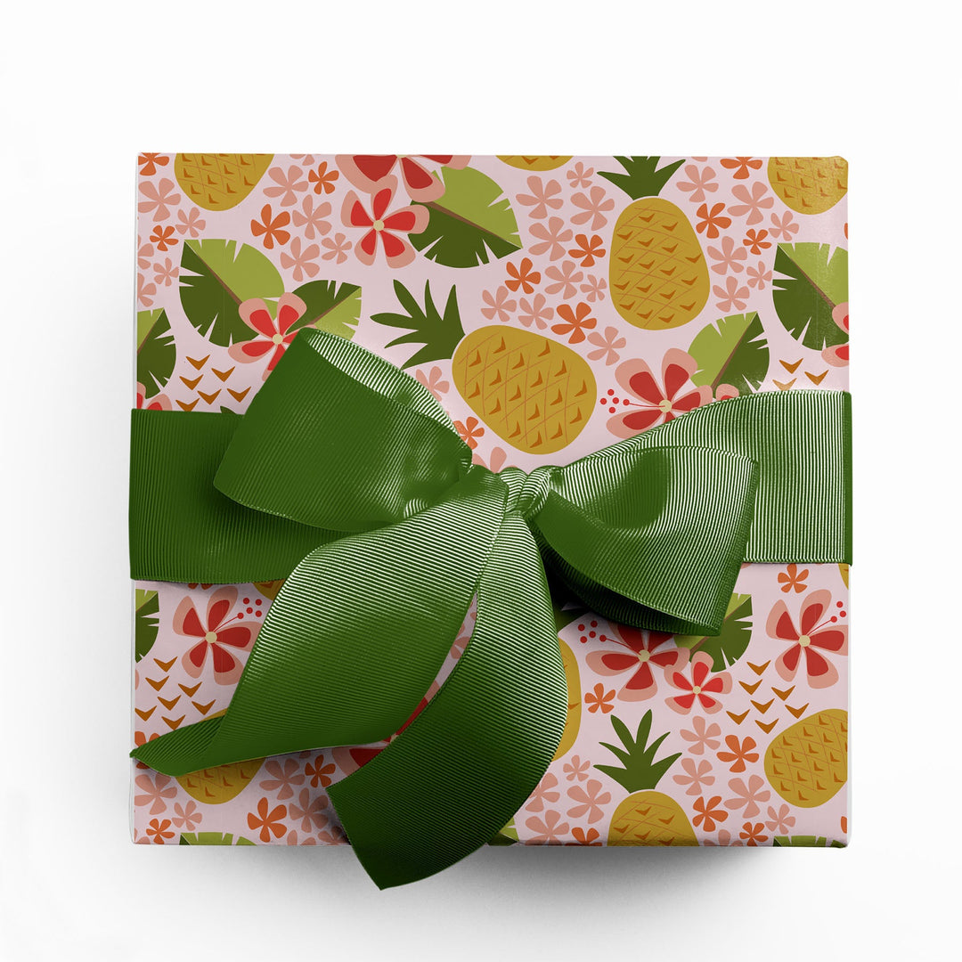 Colorful illustrated wrapping paper with bold tropical pineapple pattern