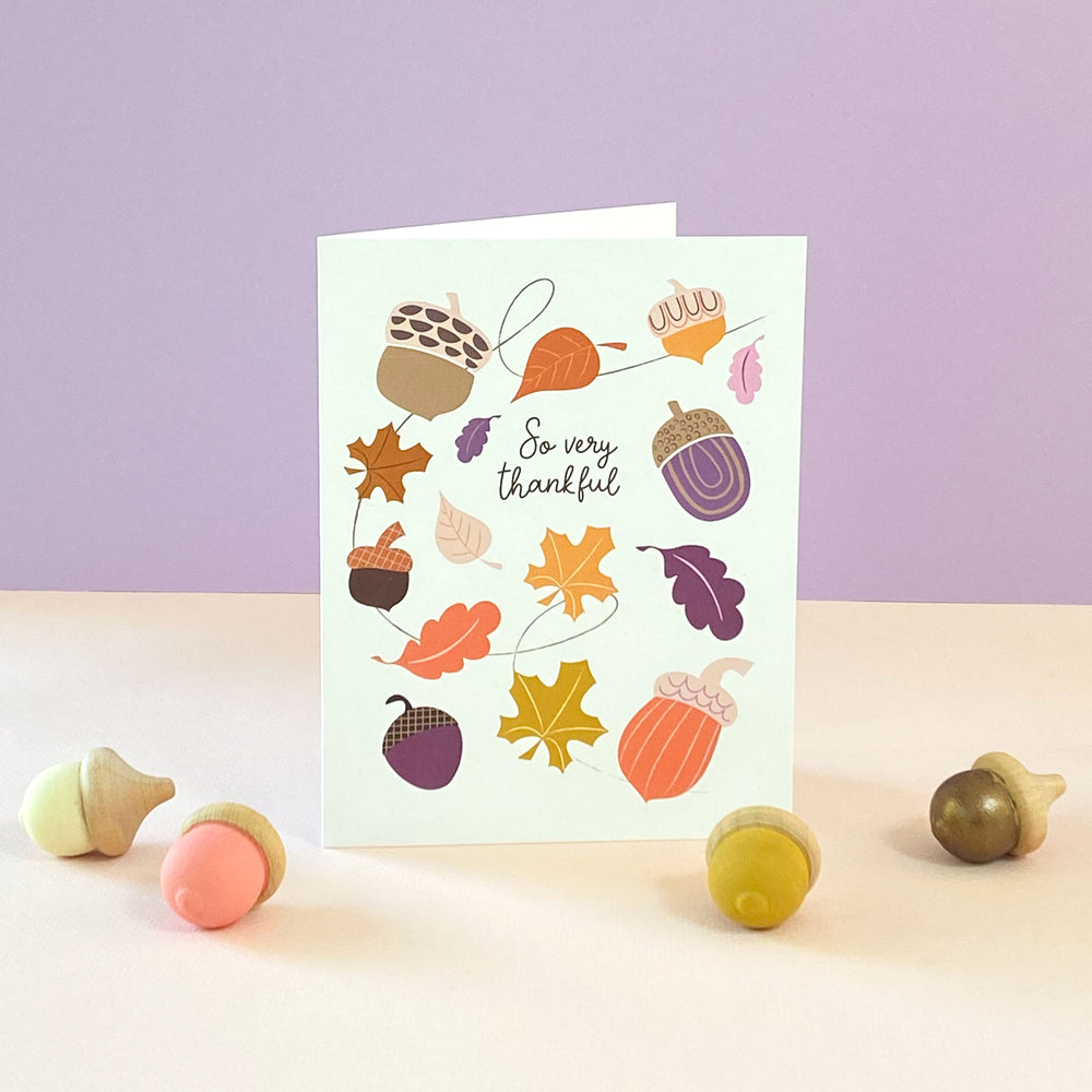 Thanksgiving thank you card with illustrated Autumn leaves and acorns design by Gigglemugg