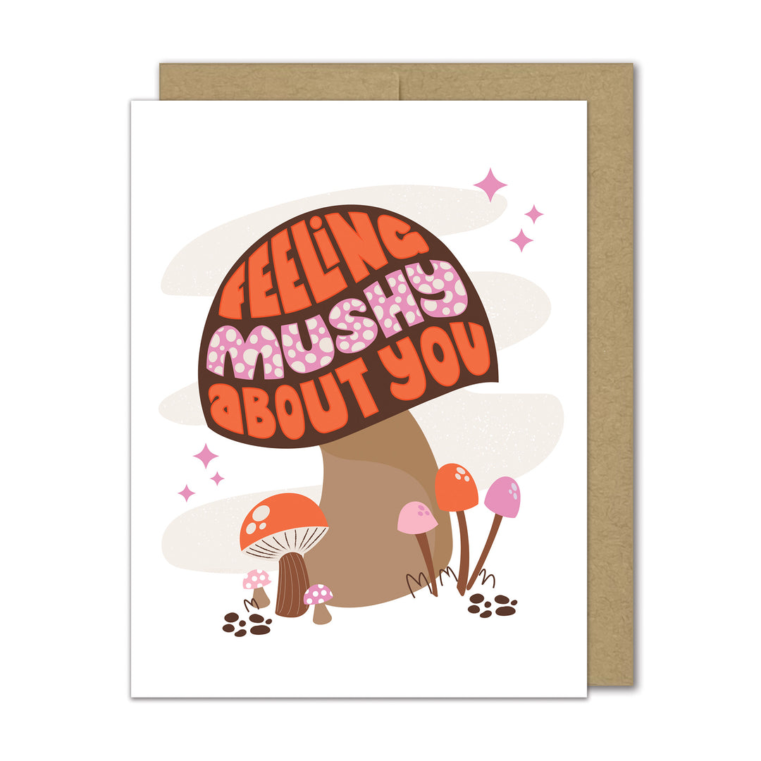 Greeting card with a mushroom illustration and text 'Feeling mushy about you' on a white background.