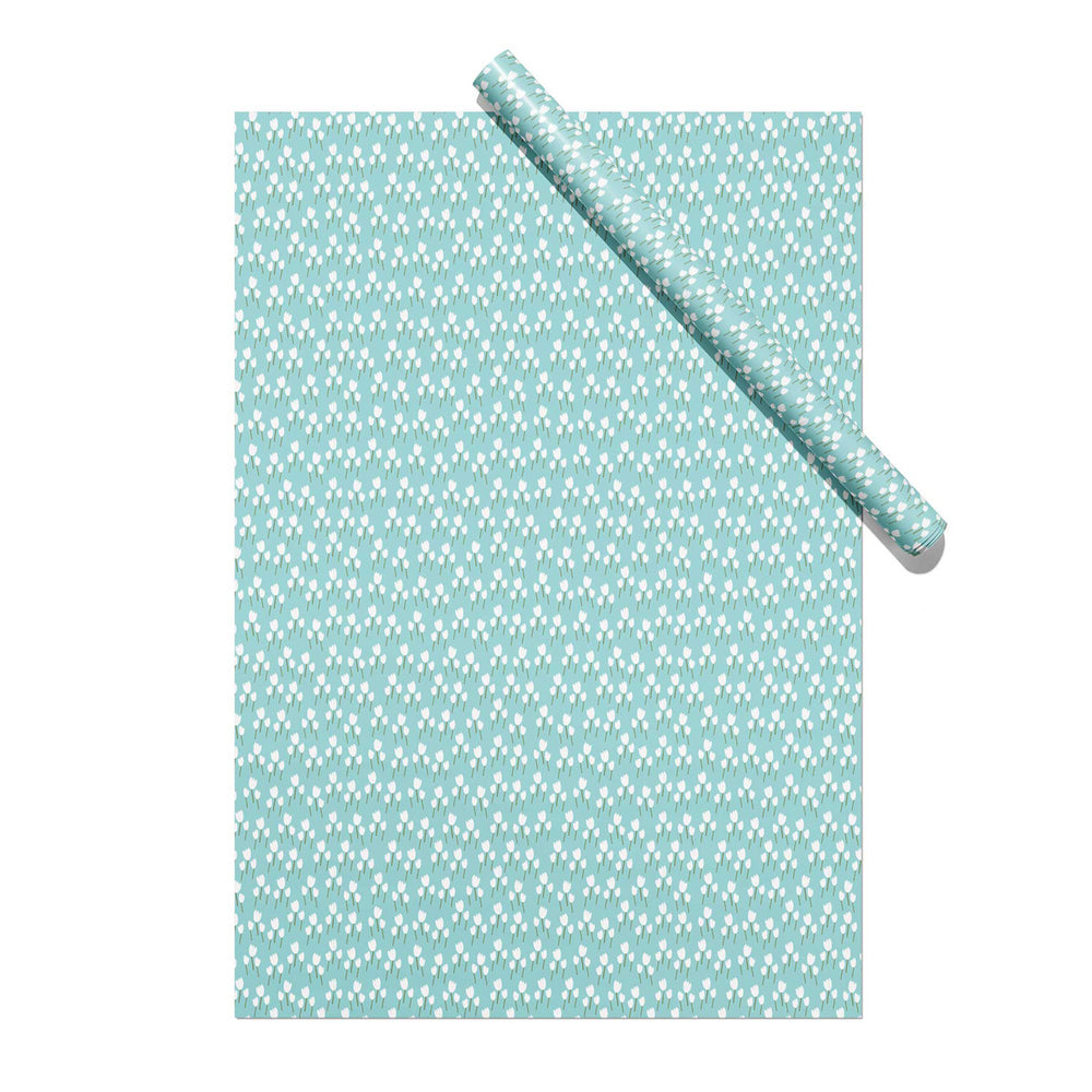 Scandi floral wrapping paper with delicate white tulip design perfect for baby shower or wedding gifts by Gigglemugg.