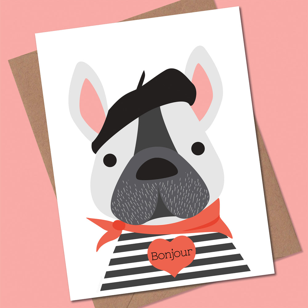 Card with a cartoon dog wearing a beret and striped shirt on a pink background