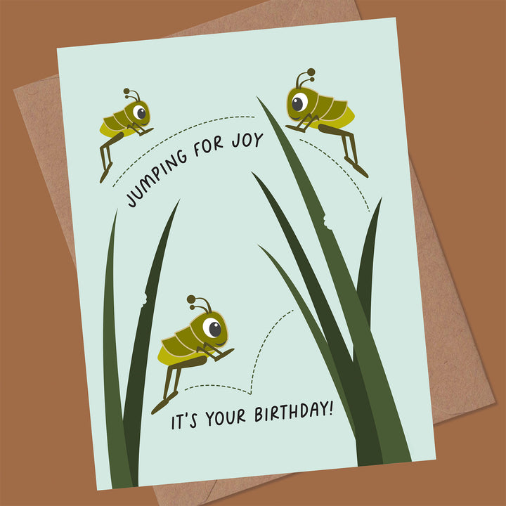 Birthday card with cartoon grasshoppers and text &