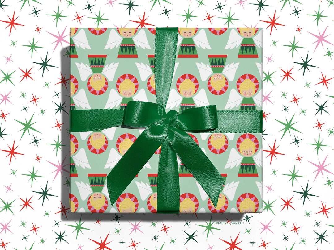 Holiday Gift wrapped in Christmas angels wrapping paper by Gigglemugg