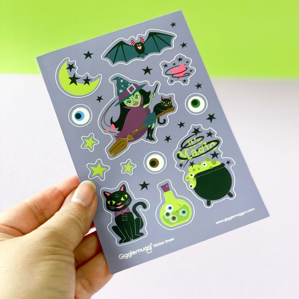 Vinyl Halloween sticker sheet with fun witch illustrations including cat, moon, cauldron, potion bottle, eyeballs, bat, and stars designed by Gigglemugg