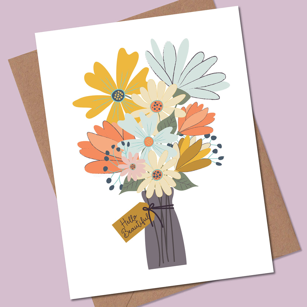 Greeting card with colorful floral design and 'Hello Beautiful' tag on a purple background
