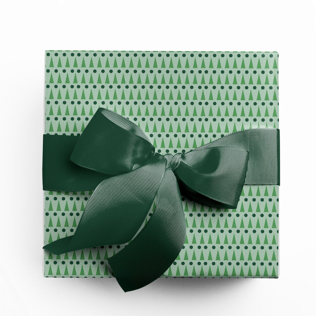 Green geometric patterned holiday wrapping paper by Gigglemugg.