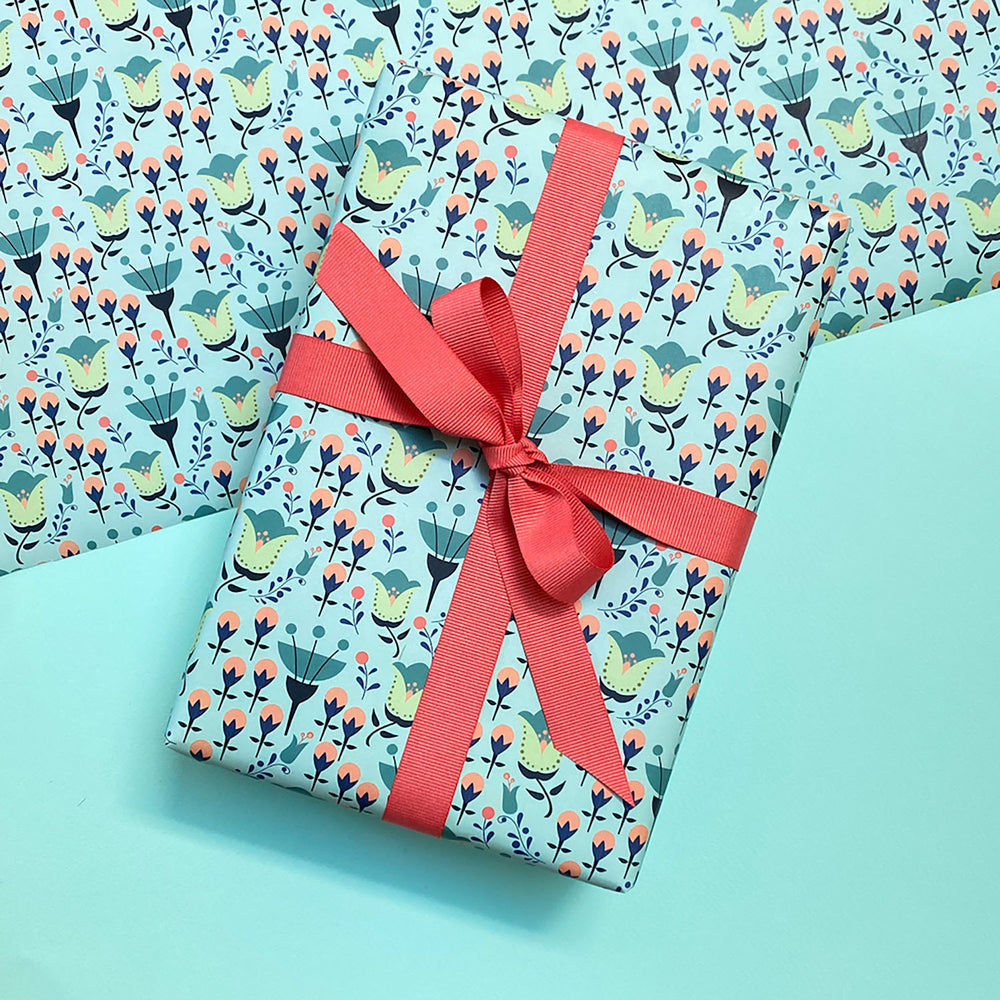 Gift wrapped in modern floral wrapping paper by Gigglemugg.