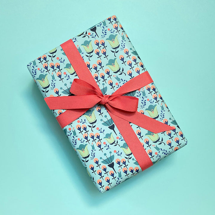 Gift wrapped in modern floral wrapping paper by Gigglemugg.