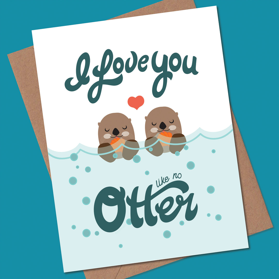 Card with two otters holding sea shells and the text &