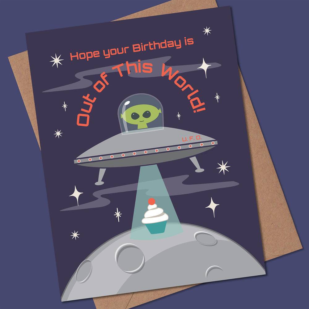 Space-themed birthday card with alien and UFO design on a dark blue background
