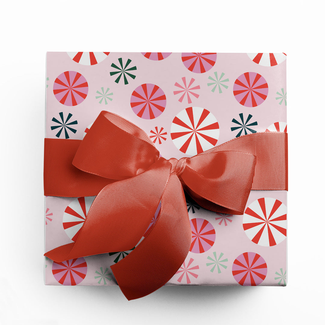 Gift wrapped in pink peppermint wrapping paper designed by Gigglemugg.