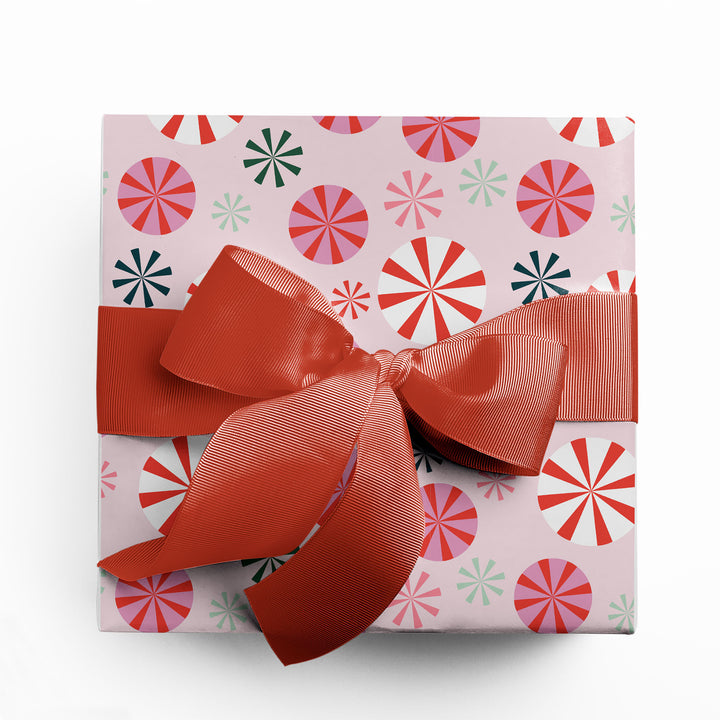 Gift wrapped in pink peppermint wrapping paper designed by Gigglemugg.