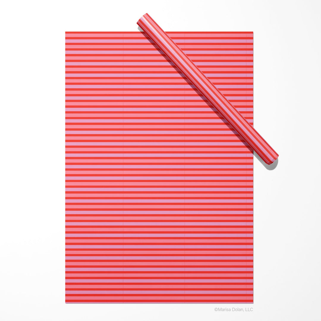 Striped Christmas wrapping paper in pink and red by Gigglemugg