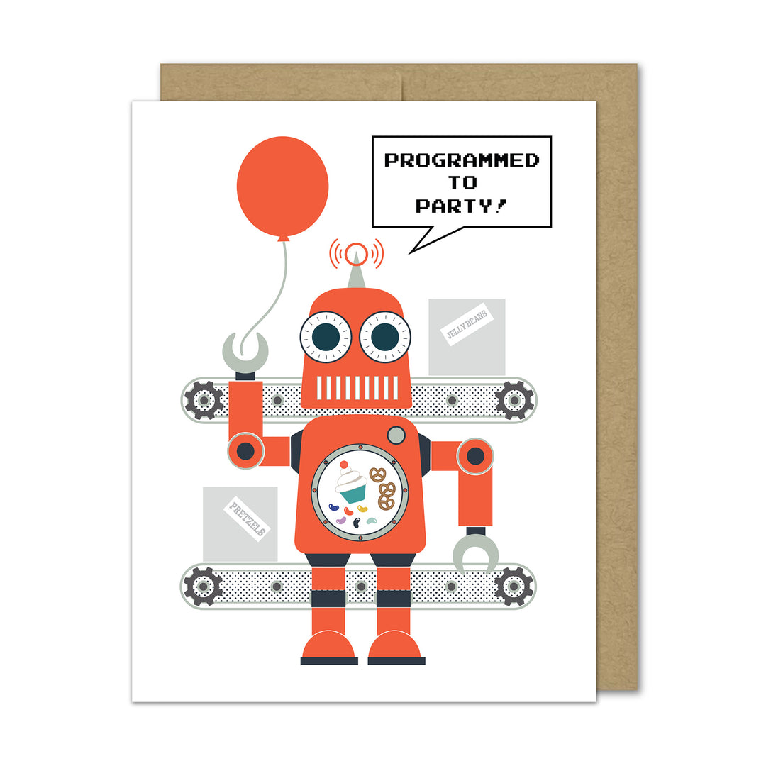 Greeting card with a robot holding a red balloon and speech bubble saying 'Programmed to Party?' with a kraft envelope on a white background.