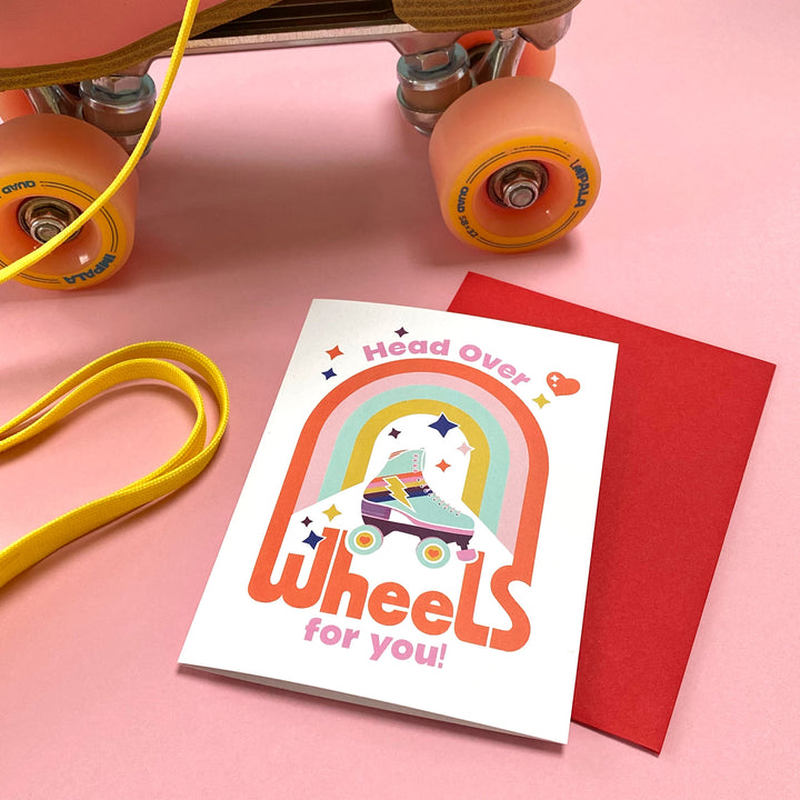 Love card for Valentines Day or anniversary with 80s roller skate design with saying, Head Over Wheels For You by Gigglemugg