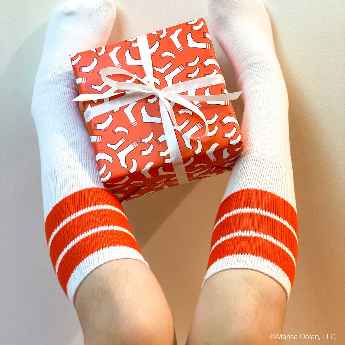 Fun socks gift wrap pattern design by designer Marisa Dolan