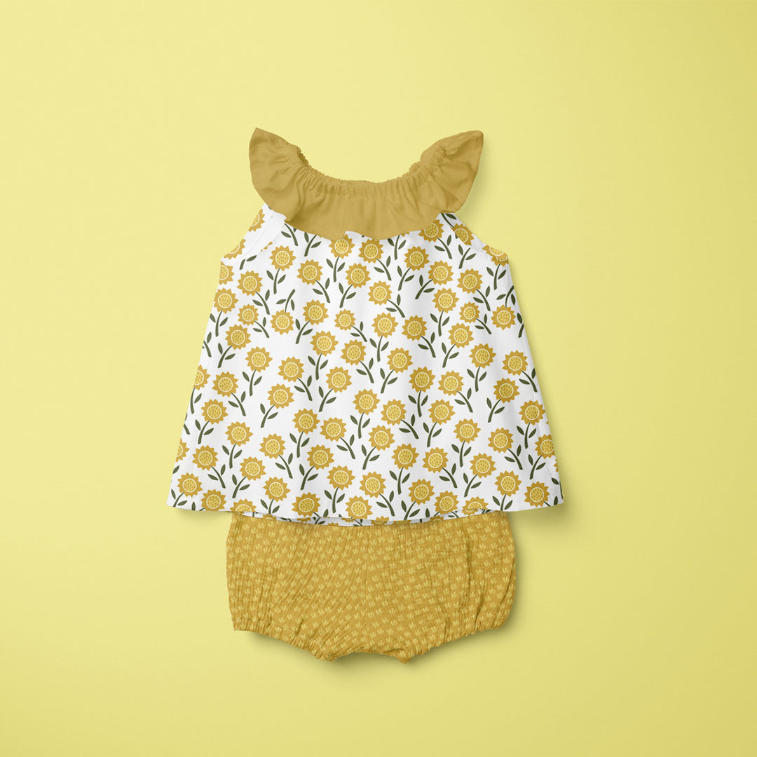 Baby sun suit featuring sunflowers pattern design by ©Gigglemugg