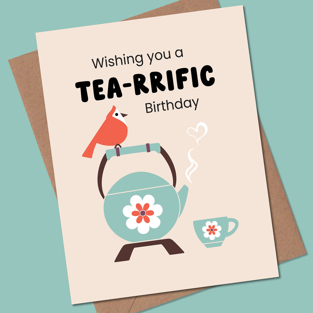 Birthday card with teapot, cup, and red bird illustration on a beige background.