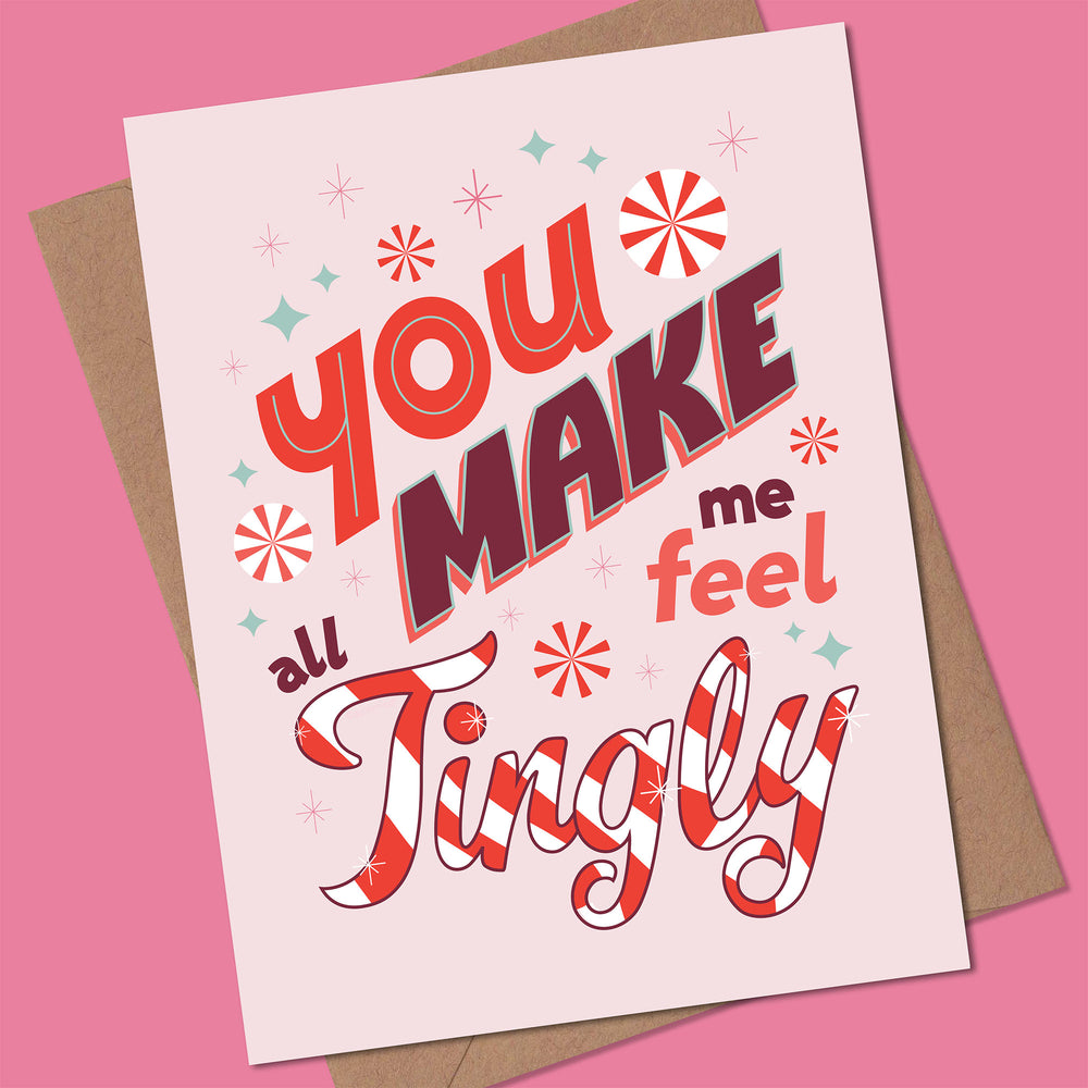 Greeting card with text 'You make me feel tingly' on a pink background